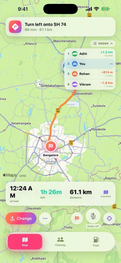The convoy map showing four cars, a shared route and turn-by-turn guidance.